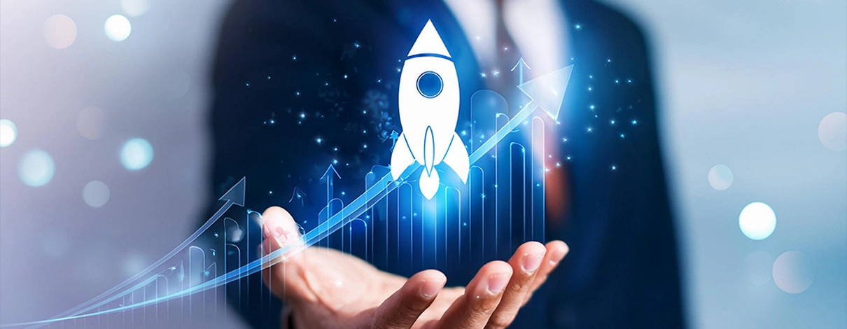 Social media marketing 14 Business professional holding a glowing rocket icon above an upward graph, symbolizing customized growth strategies and innovative marketing solutions.