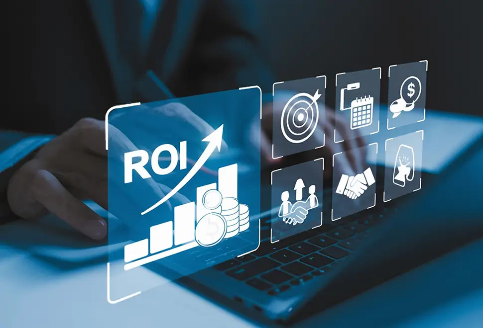 Business professional using a laptop with digital ROI and analytics icons overlay, representing measurable business impact and financial growth