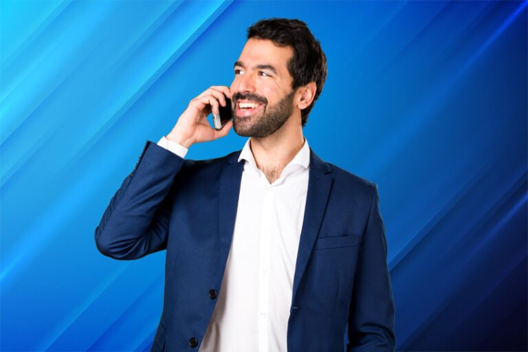 Business professional in a blue suit making a phone call against a modern blue background, representing free consultation services